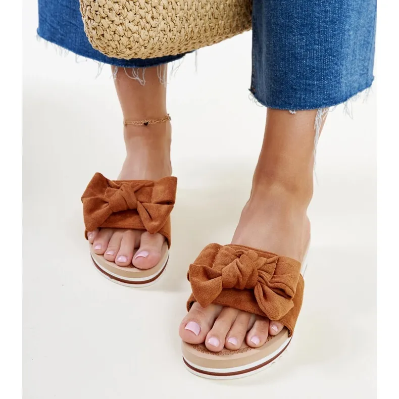 Mikhaila's brown low-heeled mules